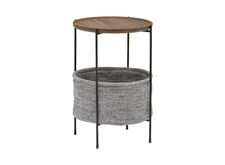 This round table has the perfect spot for your furry friend to curl up in. (Source: Amazon)