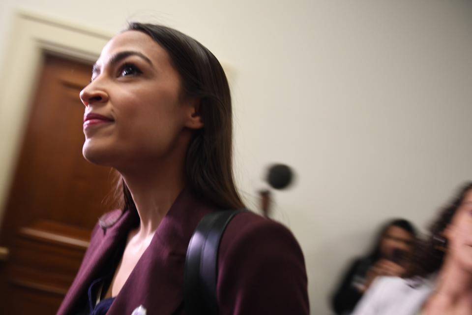 US Congresswoman Alexandria Ocasio-Cortez(D-NY) arrives to hear Michael Cohen, attorney for President Trump, testify before the House Oversight and Reform Committee in the Rayburn House Office Building on Capitol Hill in Washington, DC on February 27, 2019. (Photo by Jim WATSON / AFP)        (Photo credit should read JIM WATSON/AFP/Getty Images)