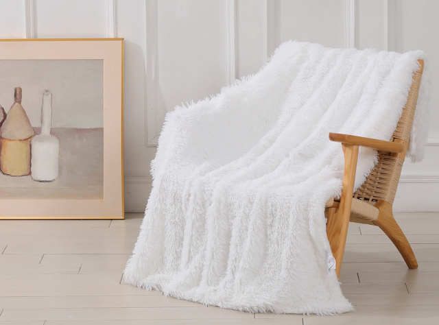 Cozy up in this $13 shaggy-chic throw blanket — it's 60% off for