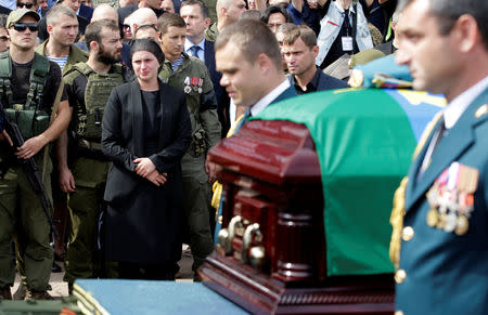 Natalia Zakharchenko the widow of Prime Minister of the self-proclaimed Donetsk People's Republic Alexander Zakharchenko mourns during the funeral in Donetsk, Ukraine, September 2, 2018. REUTERS/Alexander Ermochenko