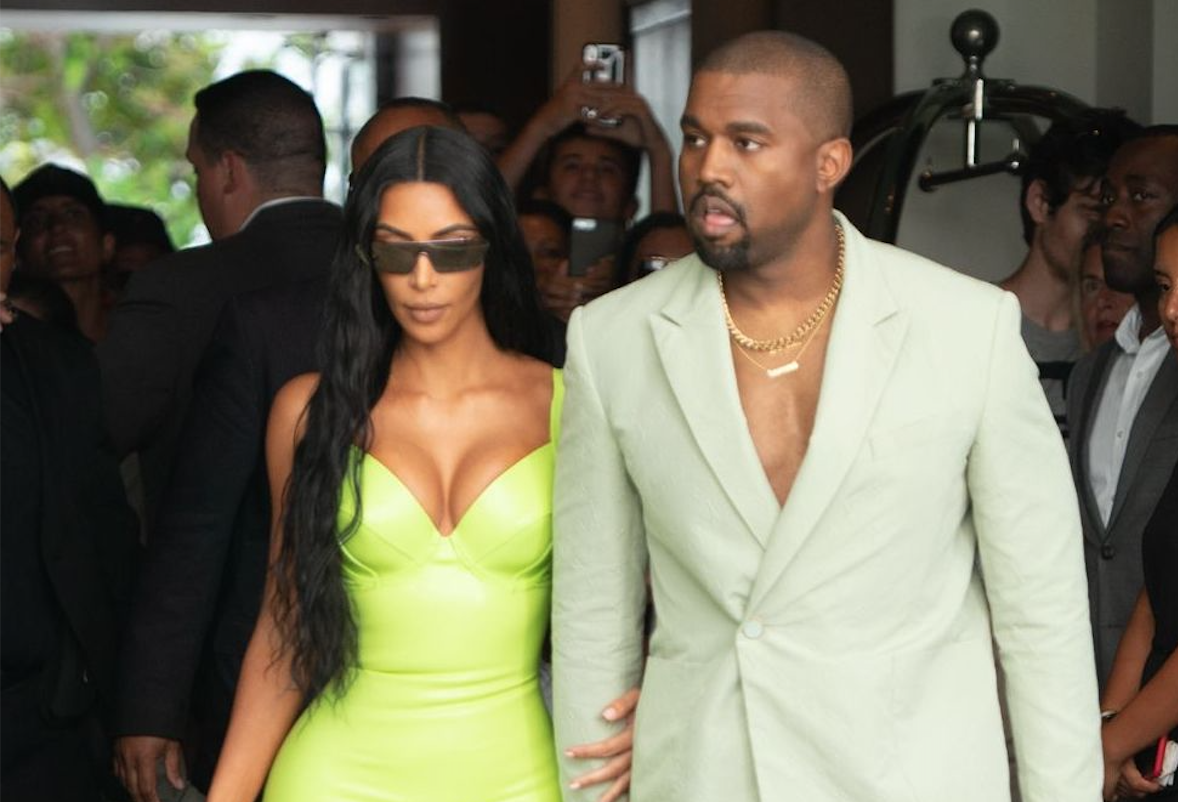 Kanye’s choice of footwear was grilled on Twitter. [Photo: Rex]