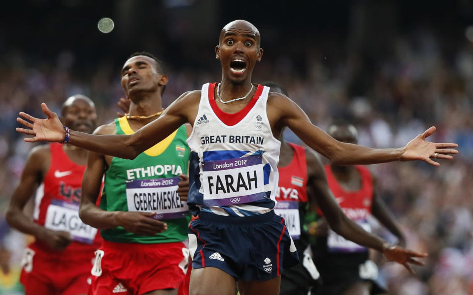 Britain's Mo Farah reacts as he wins the men's 5000m final at the London 2012 Olympic Games at the Olympic Stadium August 11, 2012. REUTERS/Lucy Nicholson (BRITAIN - Tags: SPORT ATHLETICS OLYMPICS TPX IMAGES OF THE DAY) 