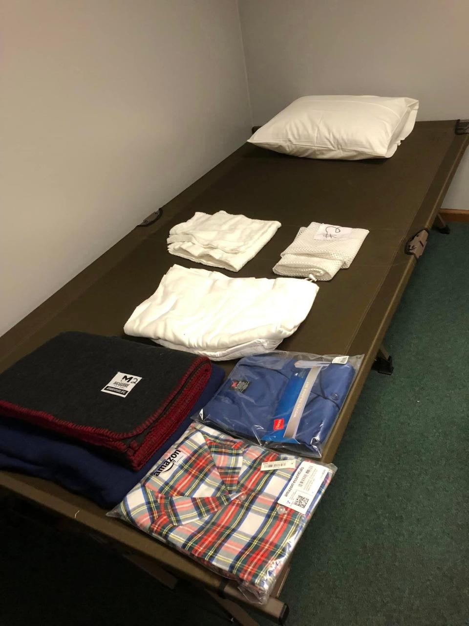 This image, courtesy of the Sturgis Extreme Weather Overnight Warming Center, shows a cot and items that would be available for use to someone in need of emergency accommodations due to displacement by severe weather.