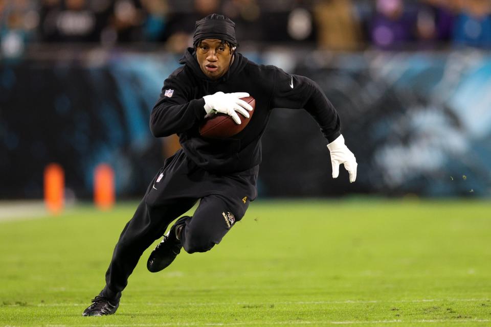 Dec 17, 2023; Jacksonville, Florida, USA; Baltimore Ravens wide receiver Zay Flowers (4) warms up before a game against the Jacksonville Jaguars at EverBank Stadium. Mandatory Credit: Nathan Ray Seebeck-USA TODAY Sports