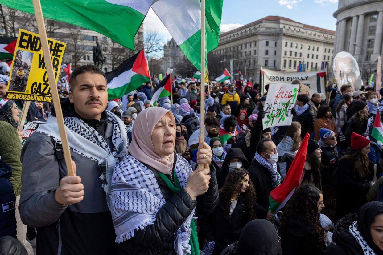 A mother and son duo attend the March on Washington for Gaza in Washington DC, United States, on Jan. 13, 2024.