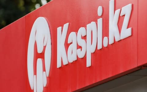 The Kaspi Bank logo in seen at the bank's branch in Almaty, Kazakhstan