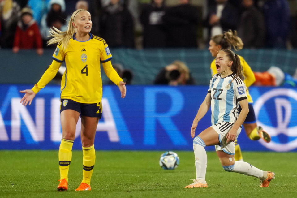 Argentina's Estefania Banini, right, reacts besides Sweden's Stina Lennartsson during the Women's World Cup Group G soccer match between Argentina and Sweden in Hamilton, New Zealand, Wednesday, Aug. 2, 2023. (AP Photo/Abbie Parr)