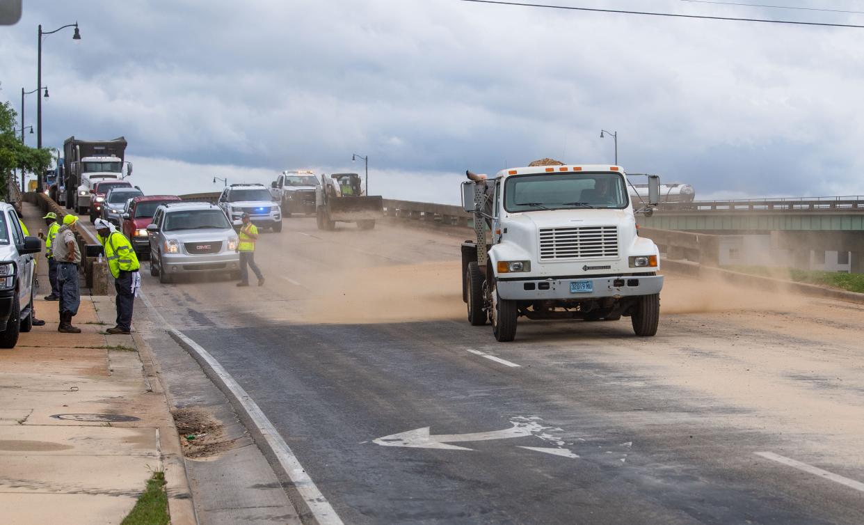 After another spill on Monday of raw chicken parts in downtown Tuscaloosa – the third since April 26, as seen in this file photo – state road officials have asked chicken processors to choose a different route.