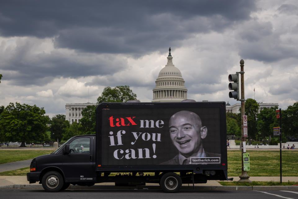 WASHINGTON DC - MAY 17: Billionaire businessman Jeff Bezos is depicted on a mobile billboard calling for higher taxes on the ultra-wealthy near the U.S. Capitol on May 17, 2021 in Washington, DC. ing.Sponsored by a group 