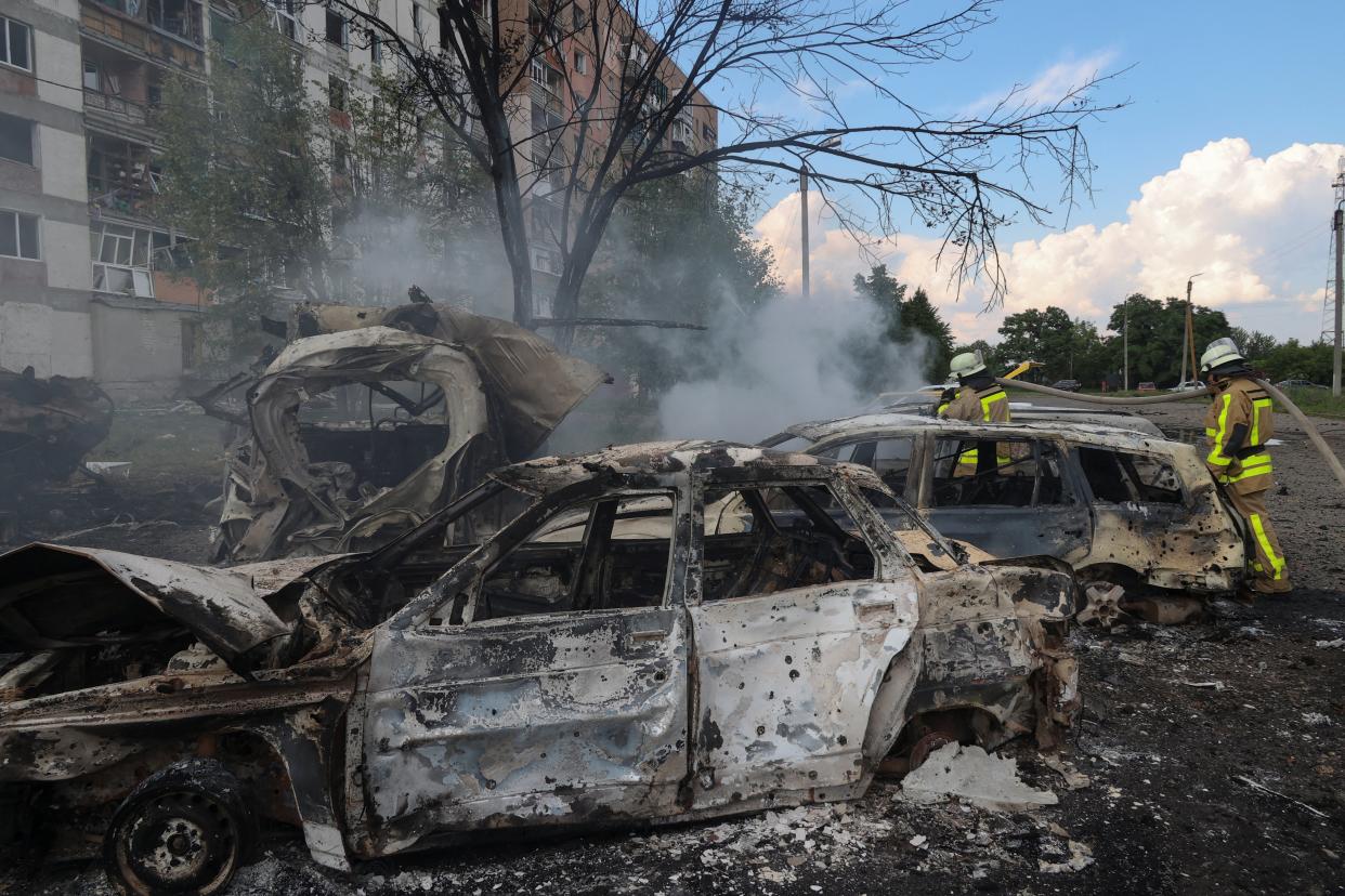 Firefighters work at a site of a Russian military strike in the town of Pervomaiskyi, amid Russia's attack on Ukraine, in Kharkiv region (REUTERS)