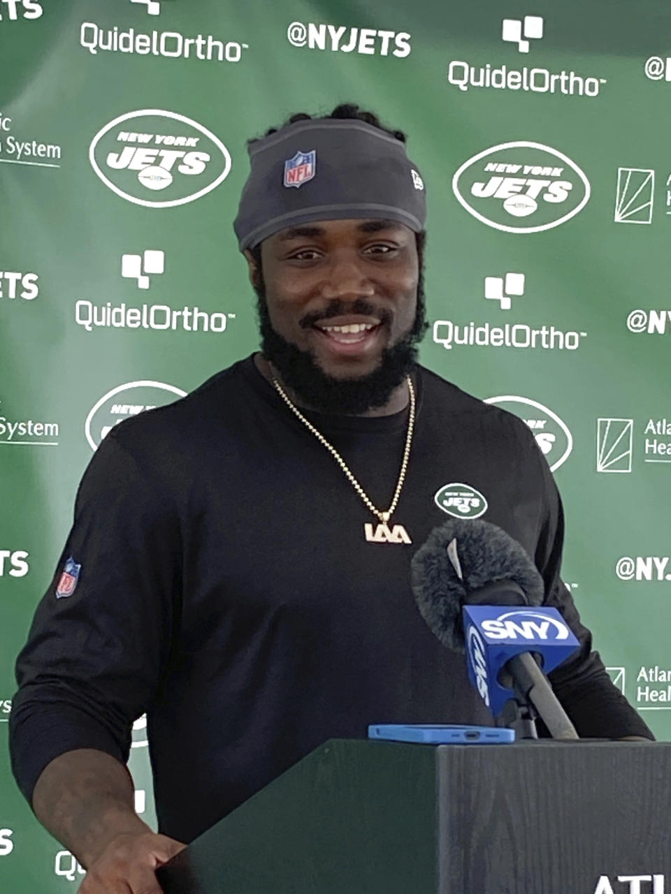 New York Jets running back Dalvin Cook speaks to reporters at the team's facility in Florham Park, N.J., on Thursday, Aug. 17, 2023. The former Minnesota Vikings star signed a one-year contract with the Jets on Aug. 16. (AP Photo/Dennis Waszak Jr.)