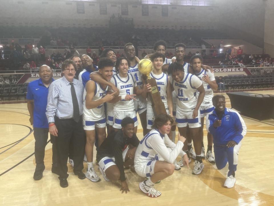 Evangel Christian celebrated its 65-62 victory over Covington Holy Cross in the championship game of the All "A" Classic in Richmond.