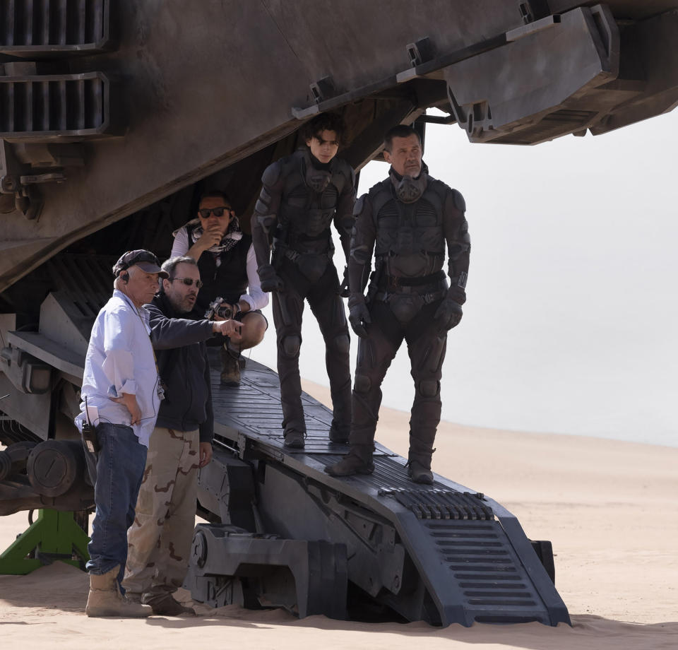 Denis Villeneuve and “Dune” cast plan a shot. - Credit: Chia Bella James