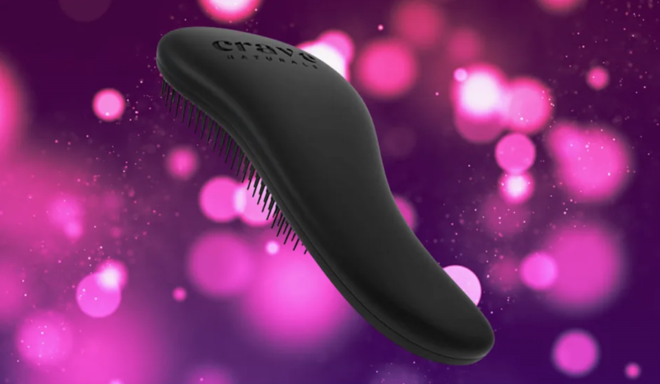 A black de-tangling hairbrush