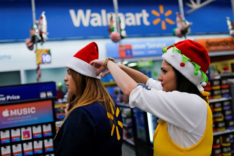 FILE PHOTO: Walmart workers get ready for Christmas season at a Walmart store in Teterboro
