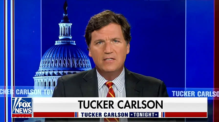 Tucker Carlson during a broadcast of his show 