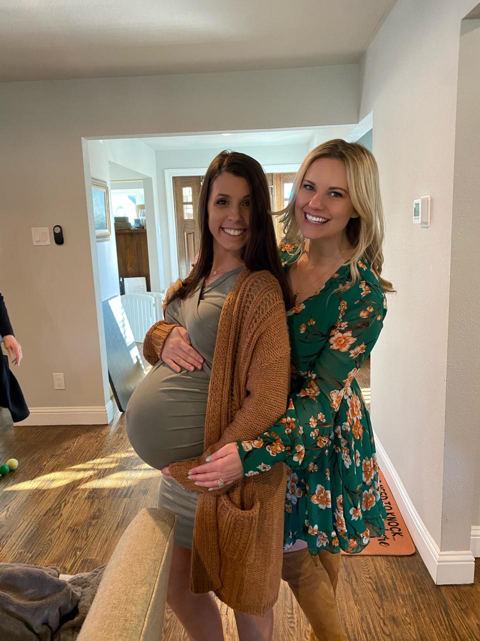 Surrogate Kasia Birdwell pregnant with soon-to-be mother Erica Gray. 