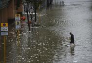 Heavy rains and driving winds brought localised flooding to parts of Hong Kong, but neighbouring Macau fared much worse, with at least three people known to have died in the huge storm