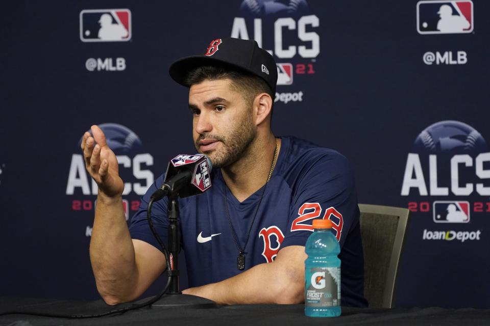 Boston Red Sox's J.D. Martinez responds to questions during a news conference before baseball practice in Houston, Thursday, Oct. 14, 2021. The Red Sox play the Houston Astros in Game 1 of the American League Championship Series on Friday. (AP Photo/Tony Gutierrez)