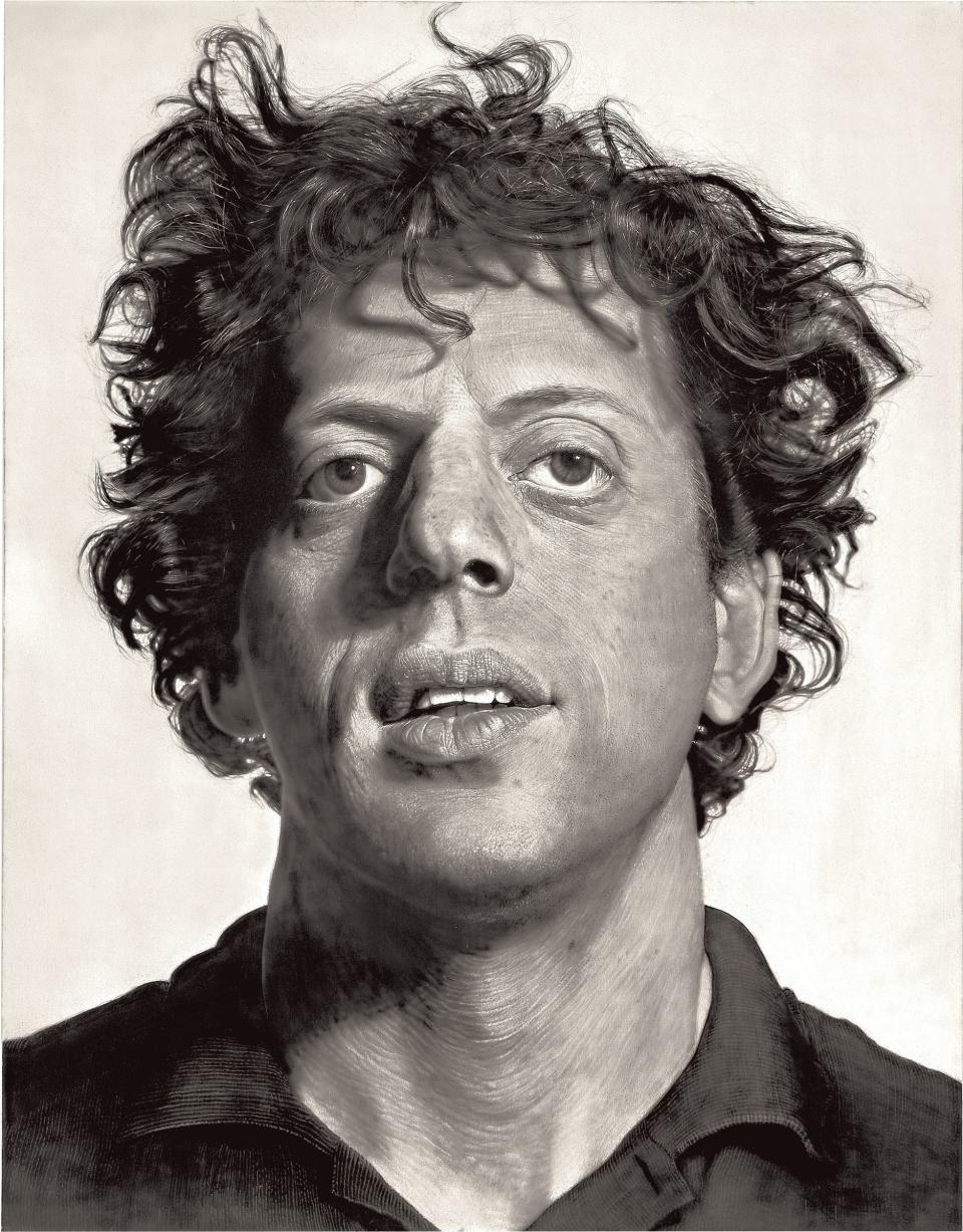 This photo provided by the Metropolitan Museum of Art shows Chuck Close's painting "Phil," in the museum's new exhibition "Regarding Warhol: Sixty Artists, Fifty Years." The exhibition begins Tuesday, Sept. 18, 2012, and runs through Dec. 31. (AP Photo/Metropolitan Museum of Art)