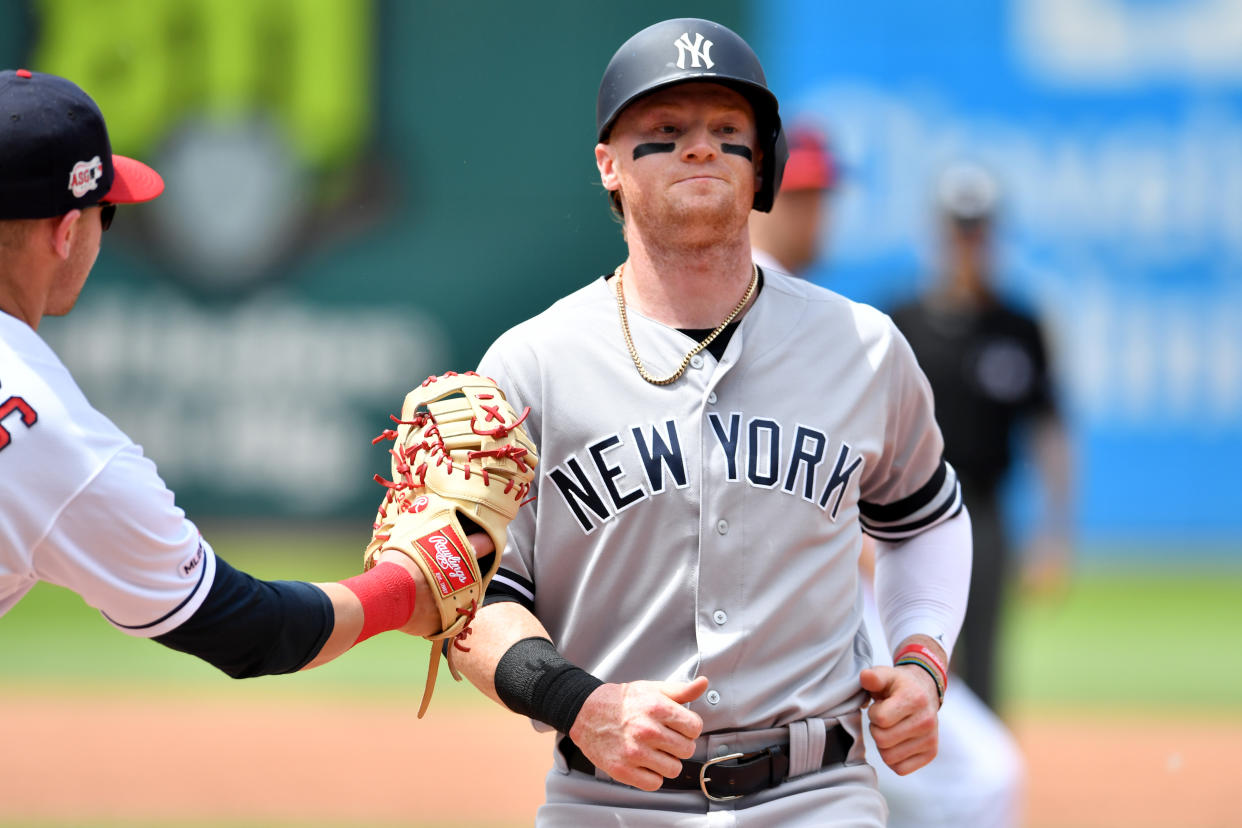 CLEVELAND, OHIO - JUNE 09: First baseman Jake Bauers #10 of the Cleveland Indians catches Clint Frazier #77 of the New York Yankees in a run down during the third inning at Progressive Field on June 09, 2019 in Cleveland, Ohio. (Photo by Jason Miller/Getty Images)