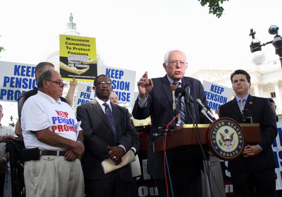 Sen. Bernie Sanders, accompanied by Rep. Brendan Boyle (D-Pa.), right, and others, speak on labor issues on Thursday, June 18, 2015, on Capitol Hill in Washington, D.C.