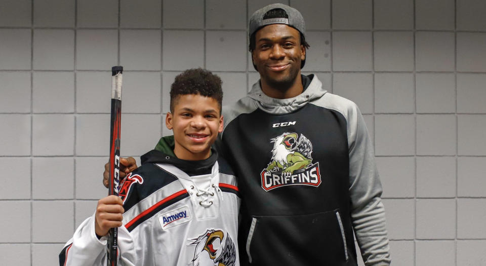 Ty Cornett meets Givani Smith after a Grand Rapids Griffins game on Friday night. (Twitter//@griffinshockey)