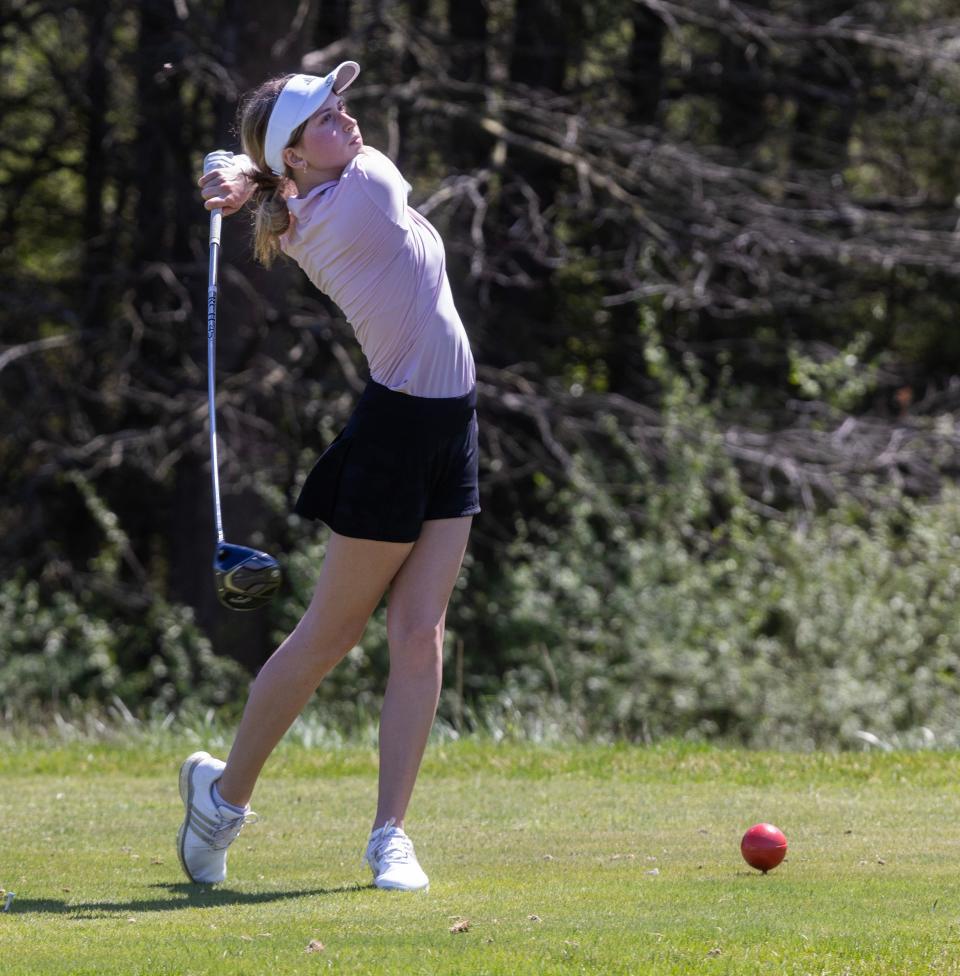 Peyton Cerminaro of Howell tees off att the tenth. Monmouth County Girls Golf Tournament at Charleston Springs in Millstone, NJ on April 15, 2024.