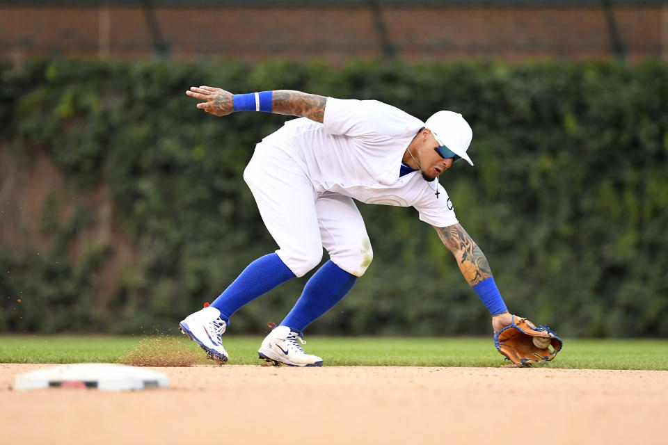 Chicago Cubs shortstop Javier Baez (9) fields the ball in the tenth inning against the Washington Nationals during an MLB Players' Weekend game at Wrigley Field. (Quinn Harris-USA TODAY Sports)