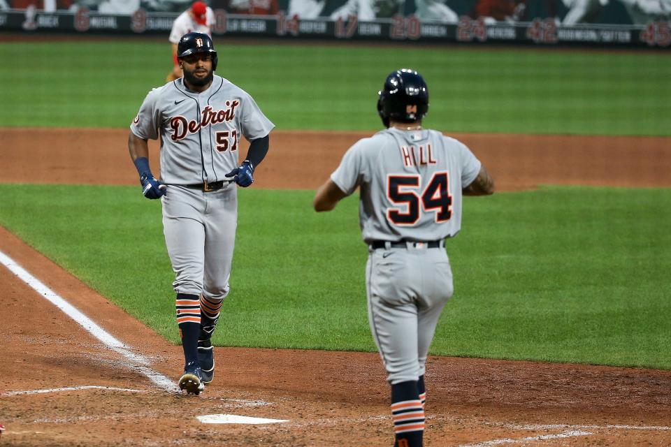 Tigers left fielder Jorge Bonifacio is greeted by Derek Hill as he nears home plate after hitting a two-run home run during the seventh inning of the Tigers' 6-3 win in the second game of the doubleheader on Thursday, Sept. 10, 2020, in St. Louis.