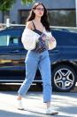 <p>Elza Gonzalez wears a cropped sweater and jeans while out for a coffee run on Wednesday in L.A.</p>