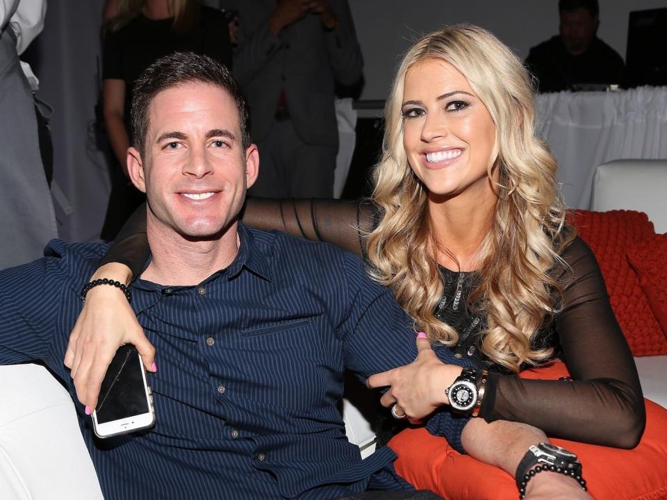 Tarek El Moussa and Christina Haack pose for a photo.