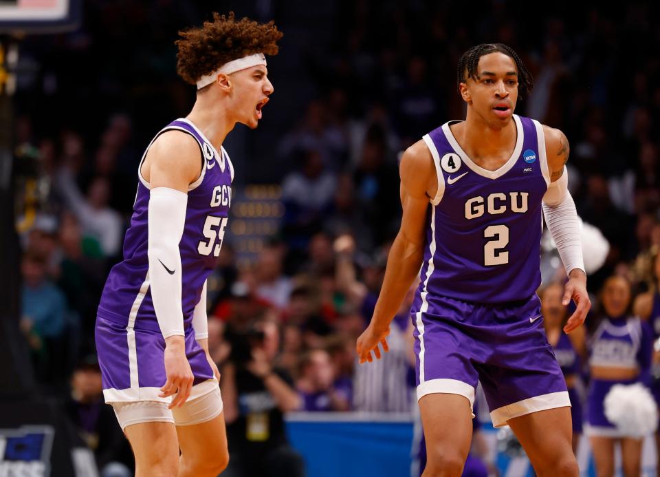 Grand Canyon Antelopes guard Walter Ellis (55) and guard Chance McMillian (2) react after a play during the first half against the Gonzaga Bulldogs at Ball Arena in Denver on March 17, 2023.