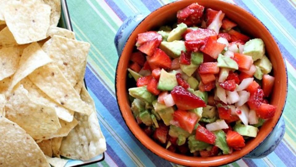 <p>Lori Lange</p><p>The best thing to happen to tortilla chips in a long time.</p><p><strong>Get the recipe: <a href="https://parade.com/26503/lorilange/strawberry-avocado-salsa/" rel="nofollow noopener" target="_blank" data-ylk="slk:Strawberry-Avocado Salsa;elm:context_link;itc:0;sec:content-canvas" class="link ">Strawberry-Avocado Salsa</a></strong></p>
