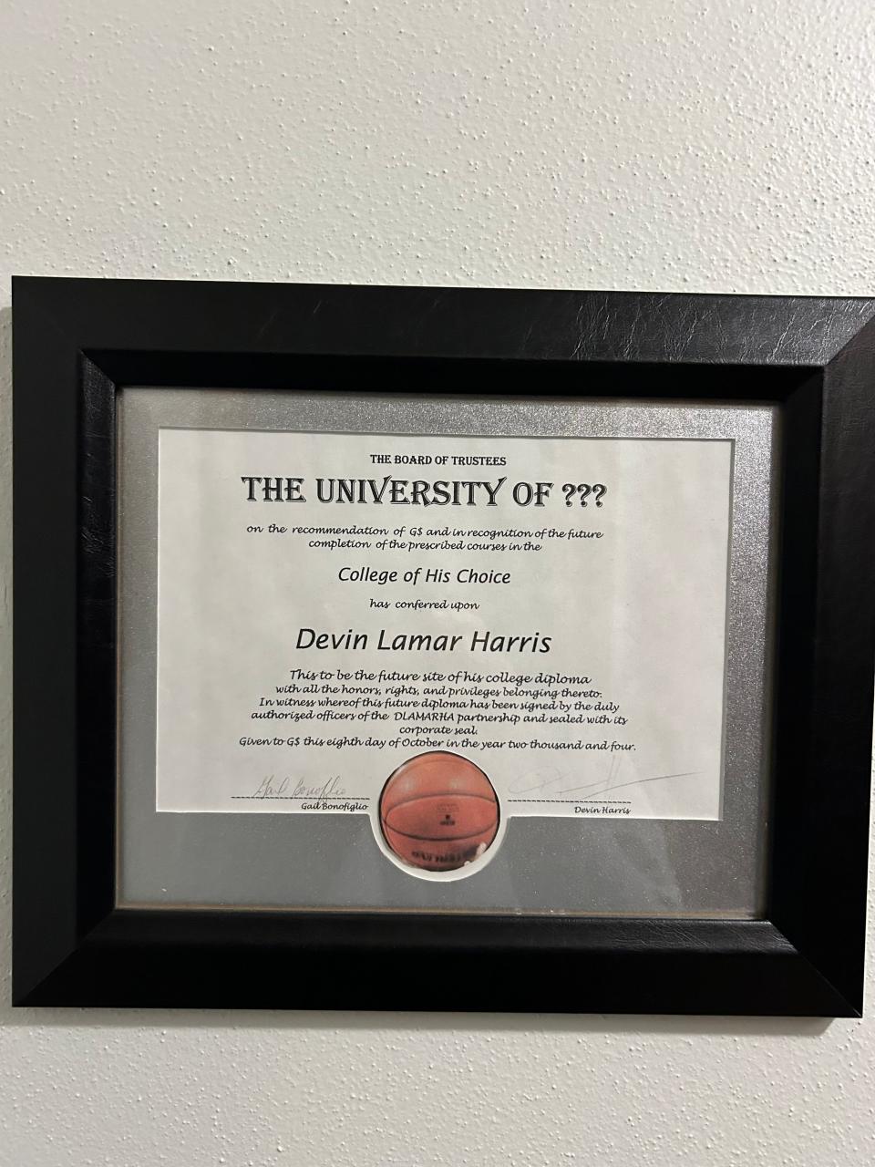 Devin Harris' high school trainer, Gail Bonofiglio, has held out hope for years to fill this frame with a copy of the real thing.