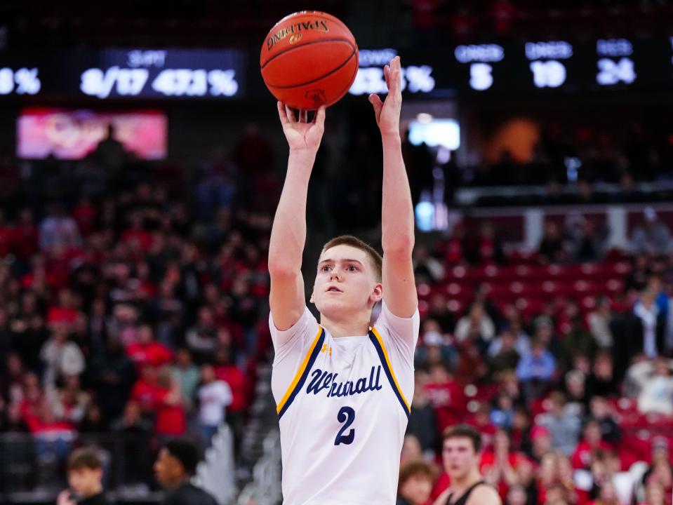 Whitnall's Myles Herro (2) hits a free throw with no time left on the clock to win the WIAA Division 2 state boys basketball semifinal, 53-52, over La Crosse Central at the Kohl Center in Madison on Friday, March 17, 2023.