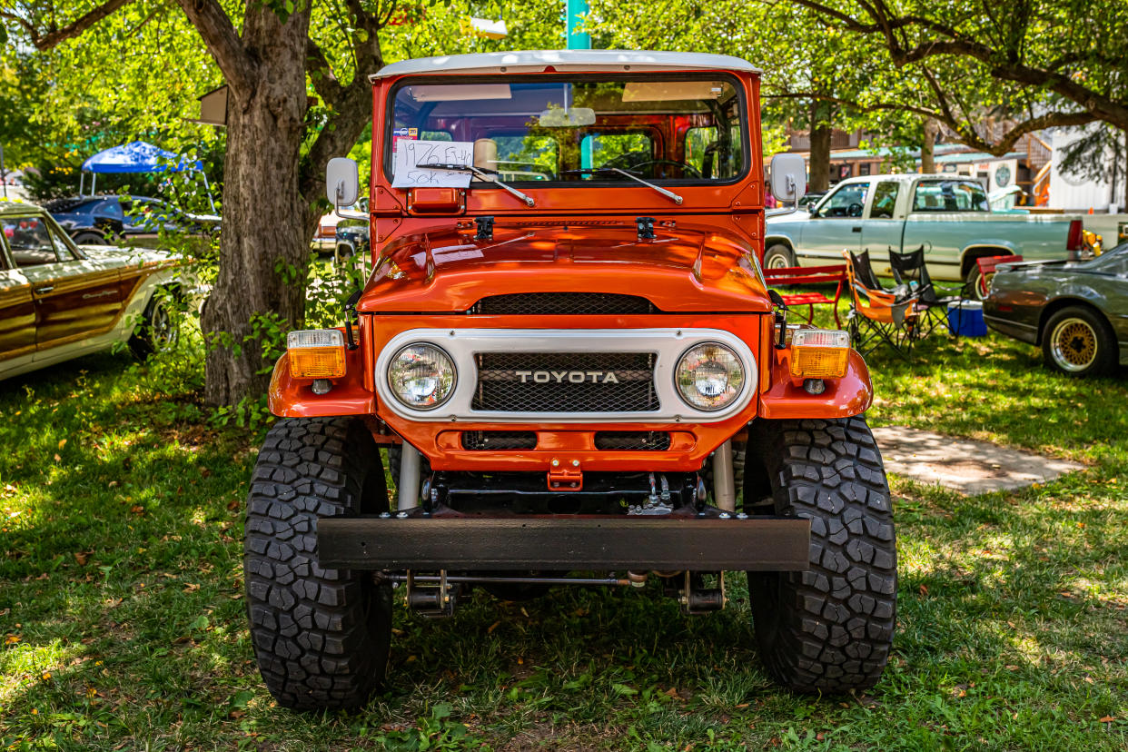 Des Moines, IA - July 03, 2022: High perspective front view of a 1976 Toyota Land Cruiser FJ40 at a local car show.