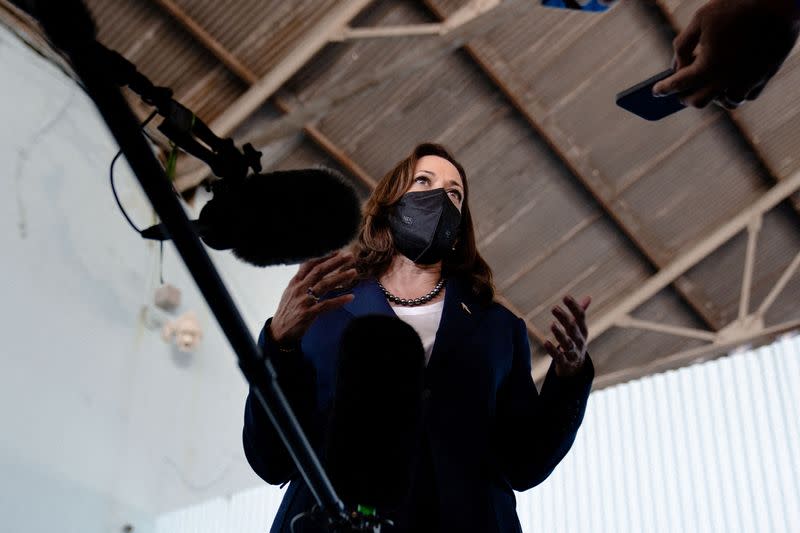 U.S. Vice President Kamala Harris talks to reporters in Palmerola