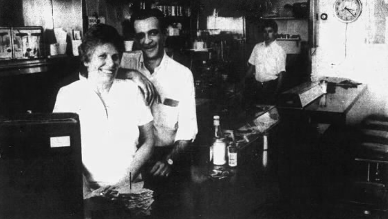 Staff poses for a photo in The Original Sandwich Shop.