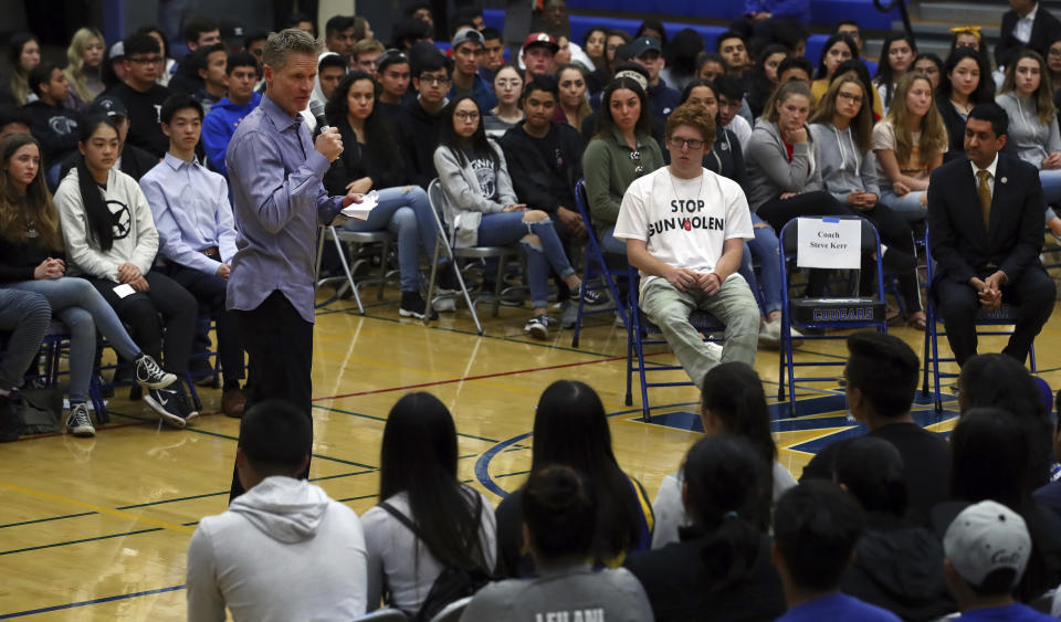 Warriors coach Steve Kerr addresses a town hall on gun violence. (AP)
