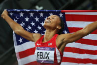 LONDON, ENGLAND - AUGUST 08: Allyson Felix of the United States celebrates after winning gold in the Women's 200m Final on Day 12 of the London 2012 Olympic Games at Olympic Stadium on August 8, 2012 in London, England. (Photo by Ezra Shaw/Getty Images)