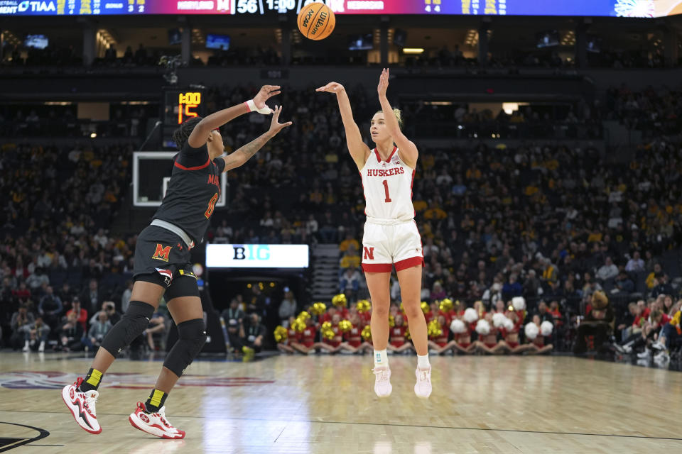 Nebraska guard Jaz Shelley (1) shoots over Maryland guard Shyanne Sellers during the second half of an NCAA college basketball game in the semifinals of the Big Ten women's tournament Saturday, March 9, 2024, in Minneapolis. (AP Photo/Abbie Parr)