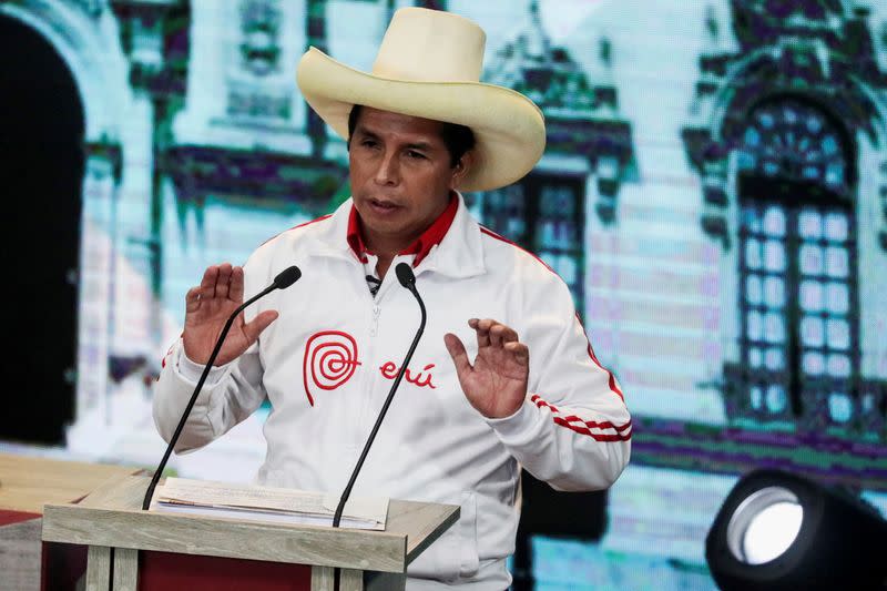 FILE PHOTO: Peru's socialist candidate Pedro Castillo gestures during a debate in Arequipa