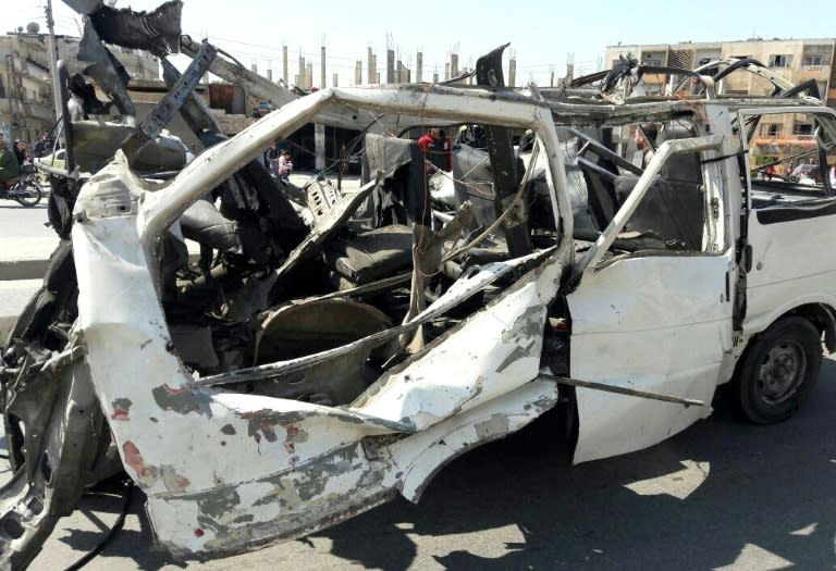 A handout picture released by the official Syrian Arab News Agency (SANA) on March 29, 2017 shows the wreckage from a bombing in Al-Zahraa neighbourhood, in the country's third city of Homs