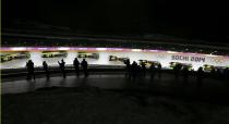 Jamaica's Winston Watts and Marvin Dixon speed down the track during the two-man bobsleigh event at the 2014 Sochi Winter Olympics, at the Sanki Sliding Center in Rosa Khutor February 16, 2014. Picture taken with multiple exposure. REUTERS/Fabrizio Bensch (RUSSIA - Tags: SPORT BOBSLEIGH OLYMPICS)