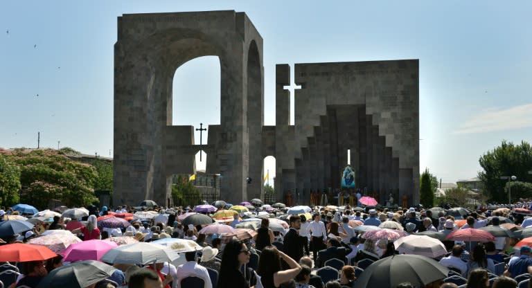 Crowds of faithful gather as Pope Francis and Catholicos of All Armenians Karekin II attend the Divine Liturgy at the Apostolic Cathedral in Etchmiadzin, outside Yerevan, on June 26, 2016