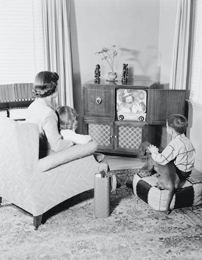 In the 1950s, television sets were bulky and the picture was in black and white. <a href="https://www.gettyimages.com/detail/photo/mother-and-children-watching-television-royalty-free-image/81774789?adppopup=true" rel="nofollow noopener" target="_blank" data-ylk="slk:H. Armstrong Roberts/Retrofile RF via Getty Images;elm:context_link;itc:0;sec:content-canvas" class="link ">H. Armstrong Roberts/Retrofile RF via Getty Images</a>