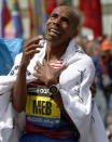 Meb Keflezighi, of San Diego, Calif., becomes emotional after winning the 118th Boston Marathon, Monday, April 21, 2014, in Boston. (AP Photo/Elise Amendola)