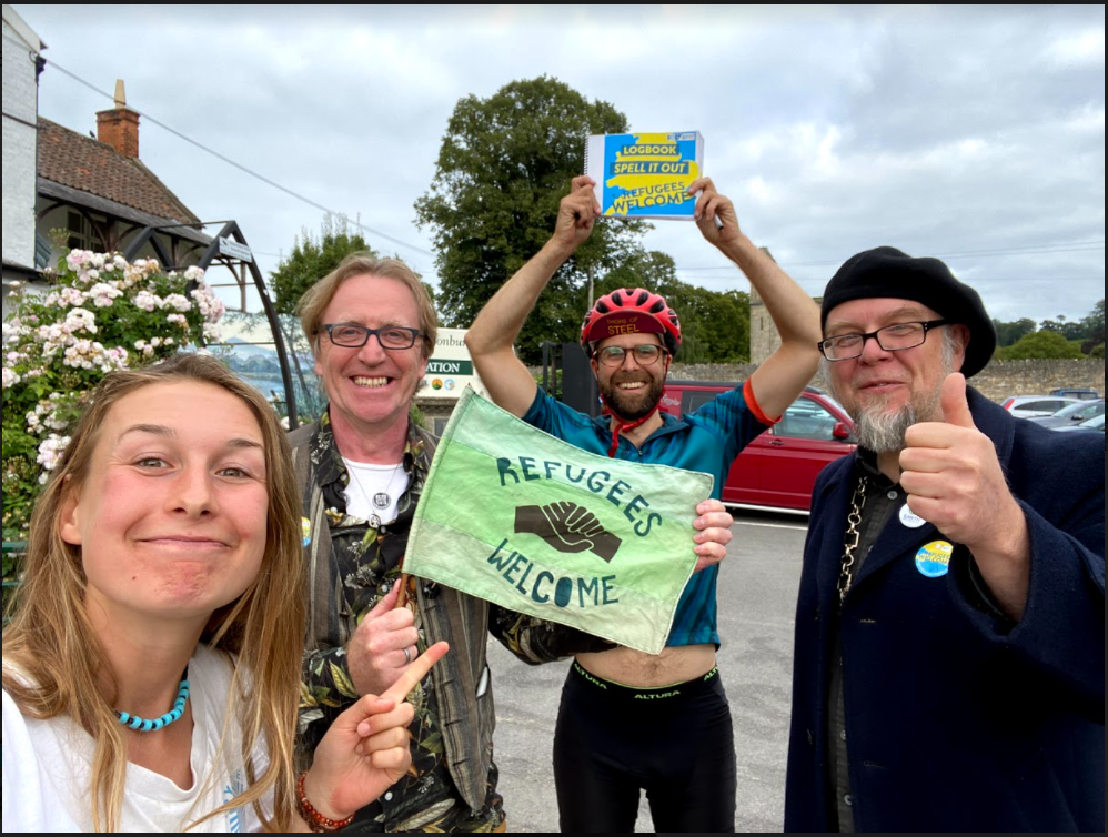 Councillor Brian Outten and Mayor of Glastonbury Jon Cousins with cyclists Georgie Cottle and David Charles (David Charles/PA).