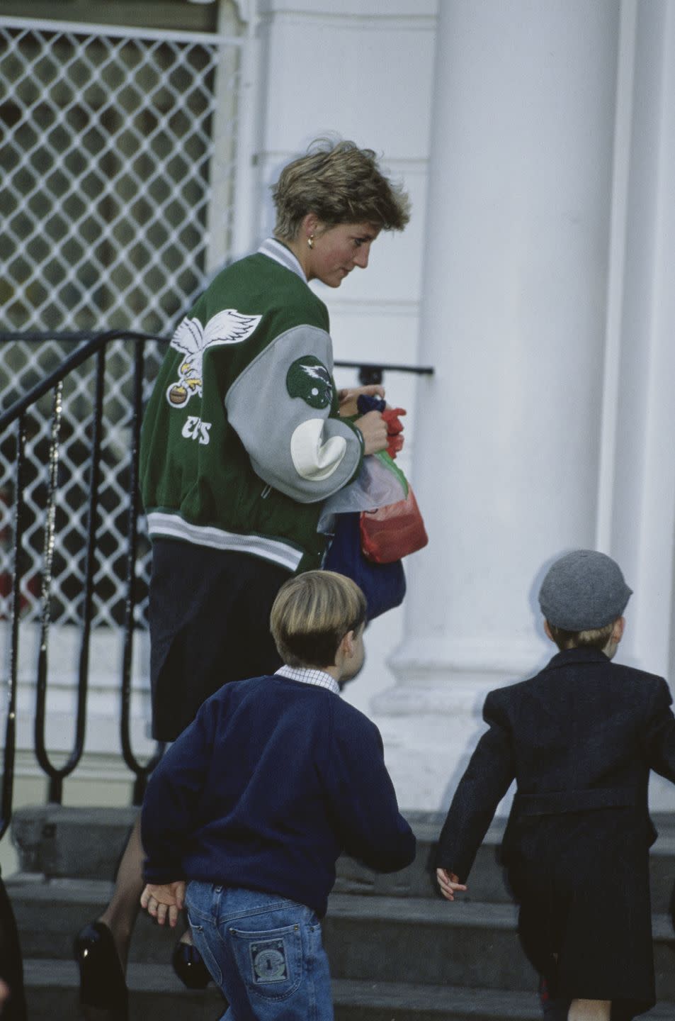 diana, princess of wales 1961 1997 wearing a philadelphia eagles jacket to drop off her son prince harry at wetherby school in london, january 1991 prince william is accompanying them photo by jayne fincherprincess diana archivegetty images